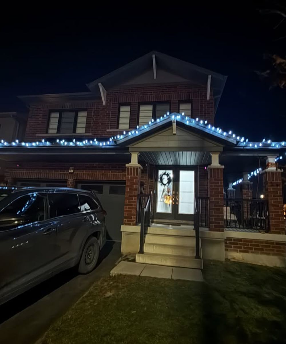 Home lit with professionally installed Christmas lights