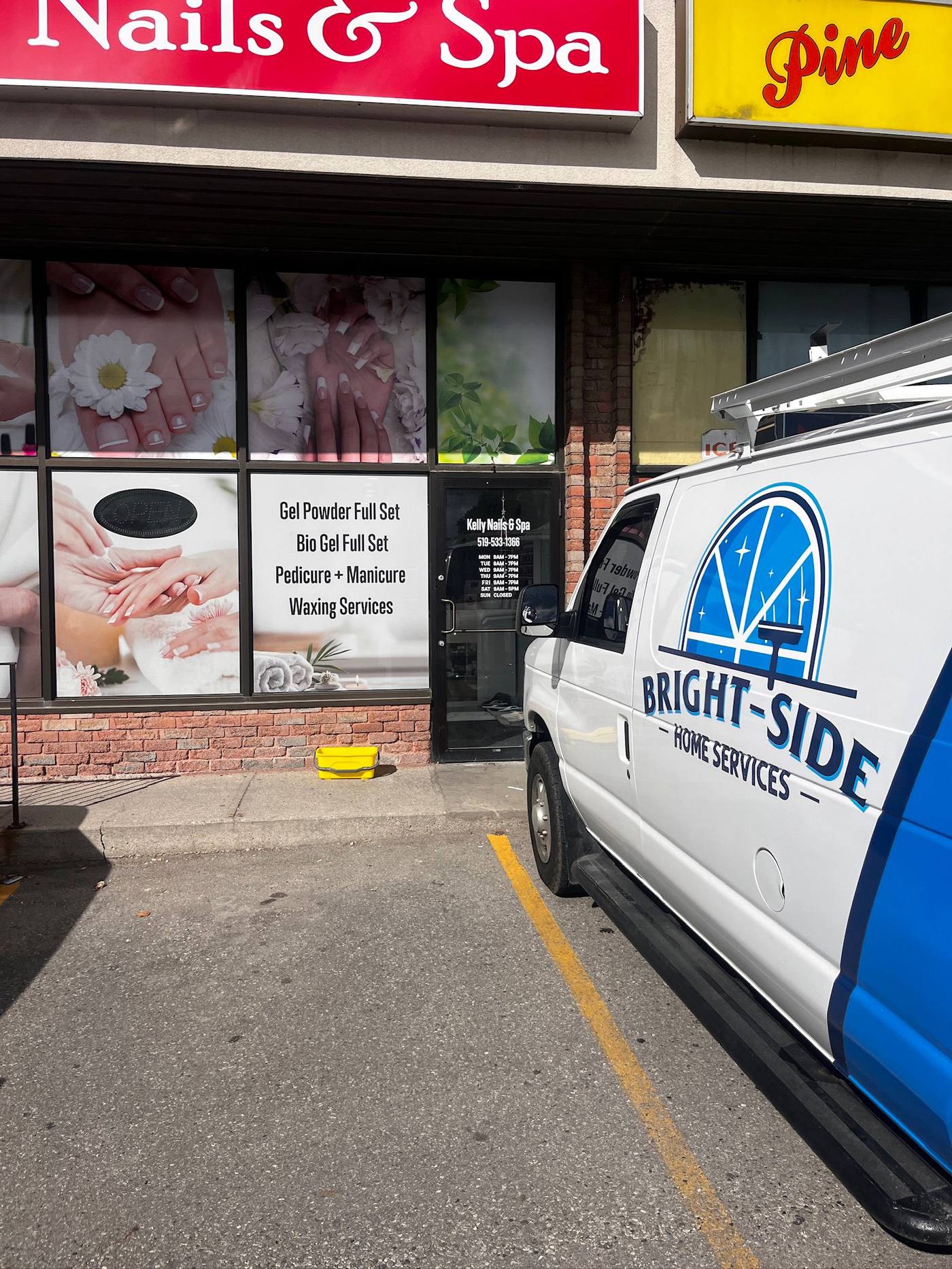 Bright-Side van parked outside a storefront job