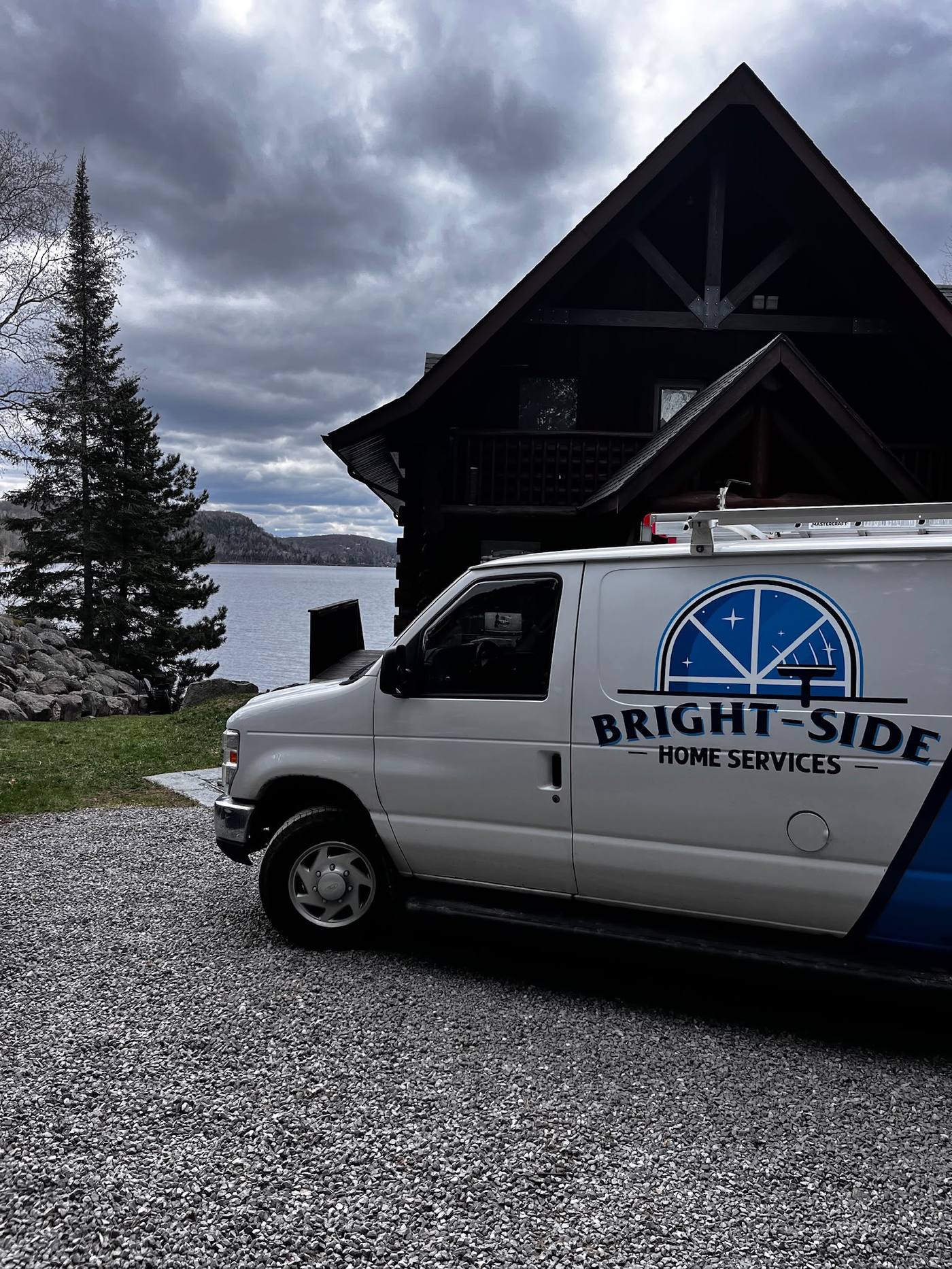 Bright-Side van parked at a cottage