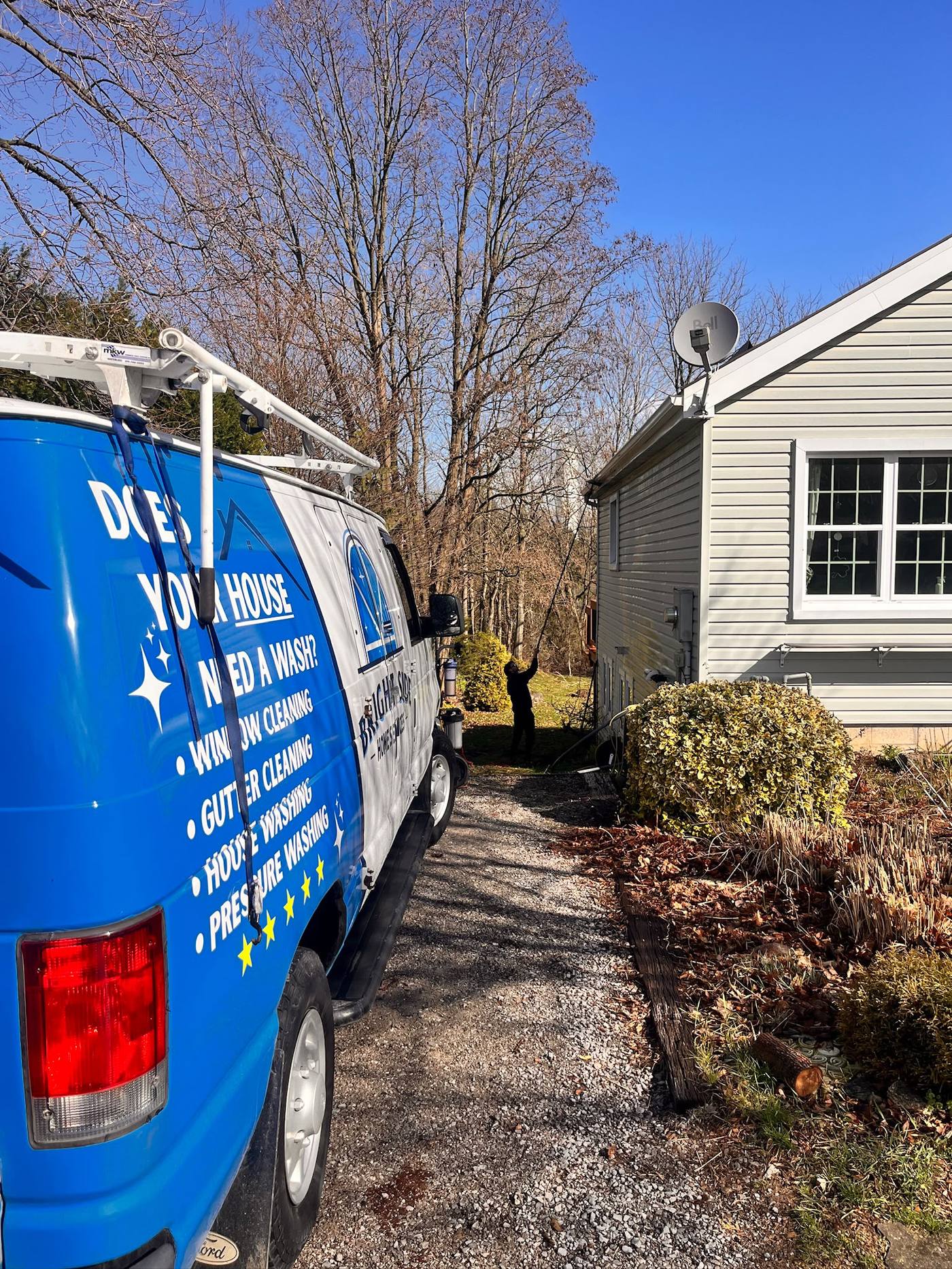 Bright-Side van beside a customer's home